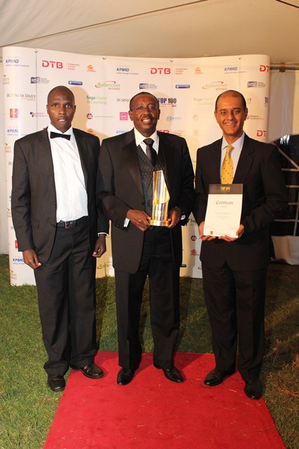 Kurrent Technologies display a trophy on becoming a member of the Kenya top 100 Mid-sized companies 2014/15 on Oct. 2014